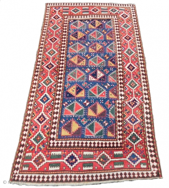 An unusual Caucasian Kazak Rug with a rare design and good early age, (248 x 137 cm) 8.1 x 4.4 ft, good condition, as found.        