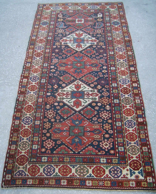 S.Caucasian Long Rug, 7.9x3.8 ft (241x116cm), good conditon, late 19th century. A label on the back reads: "St Ermins Hotel, 1914". www.rugspecialist.com           