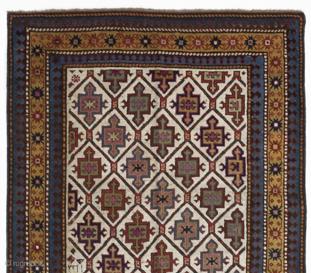 43x100 inches (110x255 cm). An ivory ground Karabagh long rug with a distinctive all over design of integrated shield and cross motifs and an attractive yellow main border of alternating terracotta and  ...