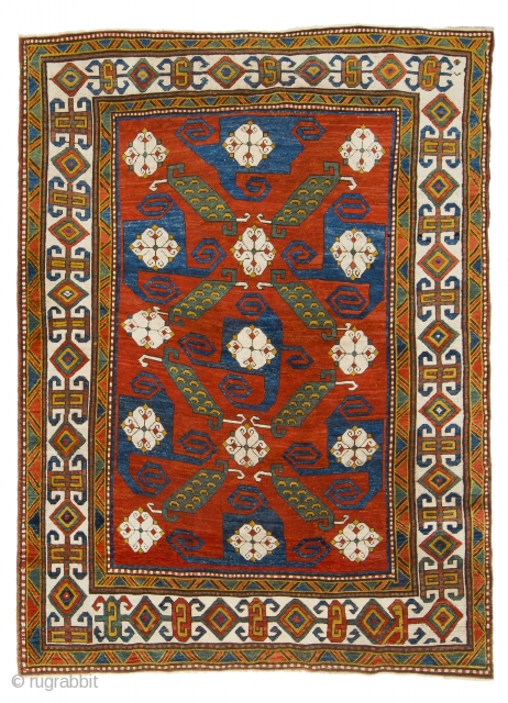 A Phenomenal Antique Caucasian Pinwheel Kazak Rug, ca late 19th Century, 5'6" x 7'1" (167x217 cm), Very good condition, approx 99% Original, 1% old repiling that is hard to notice. 
The rug  ...