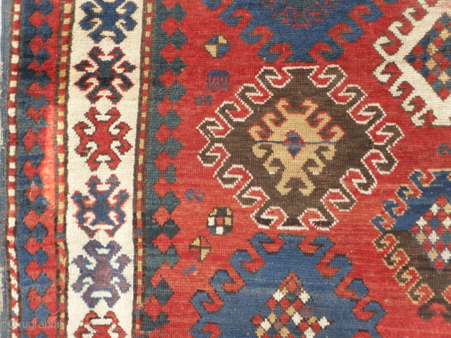 Caucasian Kazak Rug, as found, in very good condition, good pile and great colours (especially the purple), no repairs, mid 19th century.           