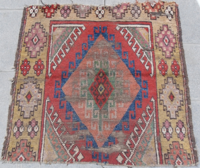 A Fragment of a yellow Konya Rug, Central Anatolia, Early 19th century, 105x107 cm                   