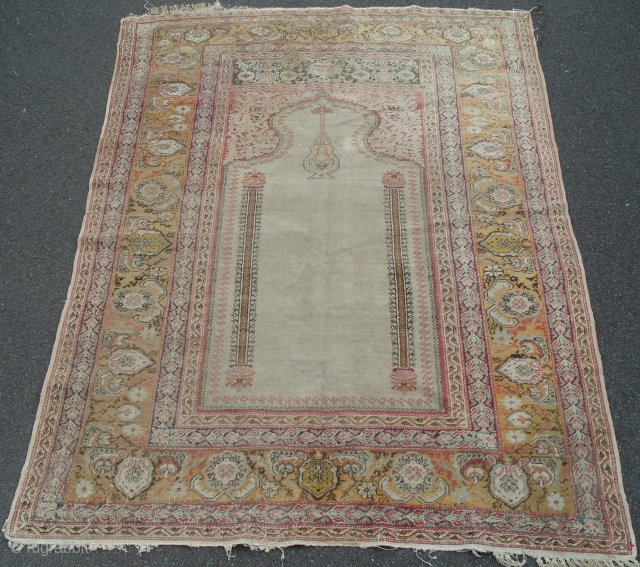 An Anatolian Prayer Rug, ca 1890, good and original condition, 69x53 inches (174 x 134 cm). www.rugspecialist.com                