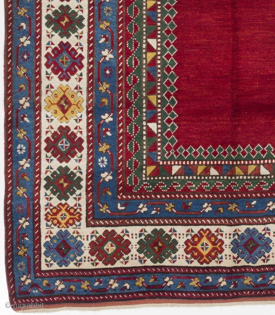 A top notch antique kazak rug with an eye catching plain red field, South Caucasus, ca 1890, 175x282 cm, very good condition, full pile, all original as found. Deep washed professionally.  