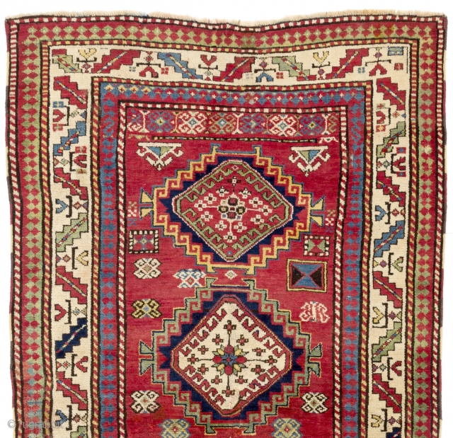 An antique South East Caucasian Rug, 4.3 x 8.4 ft (130x255 cm).                     