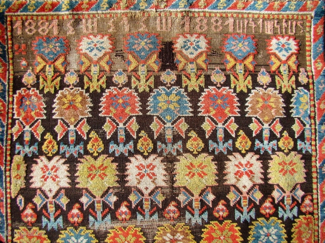 Armenian rug dated 1881 with inscription. What appears to be wear is mostly Oxidized brown and black...42X72 inches 3" narrower on top... 107X183 cm         