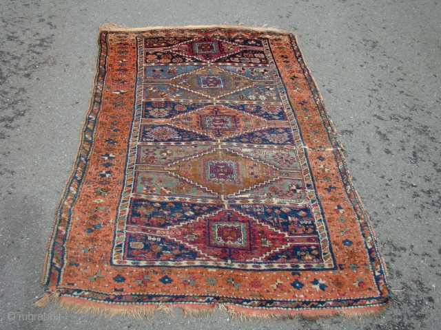 Anatolian Yoruk rug with generally good pile, opened up creases as shown. 52"X87"....132X221 Cm.                   