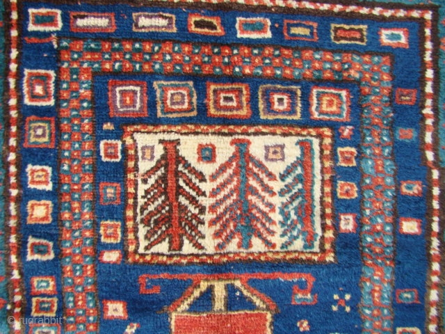 Karachof Kazak rug with full pile and intact kilim endings. Unusual directional pattern, great colors and lustrous wool. Two rough corners as shown and several secured holes that are visible from the  ...