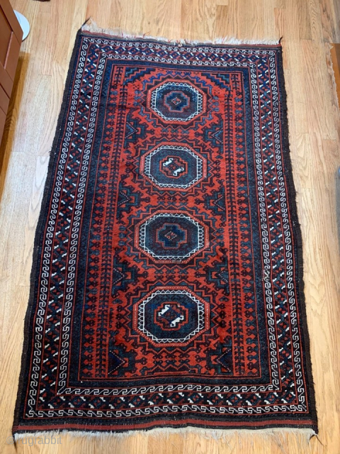 Antique Baluch rug with unusual pattern... Could be a prayer rug, note the change of inner Tree border at the top end..
With wear and small repairs as shown in the last two  ...
