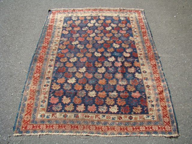 Caucasian Kuba rug. Wool foundation with some wear and oxidation as shown. 

Measures 48" X 65".... 122X165 cm               