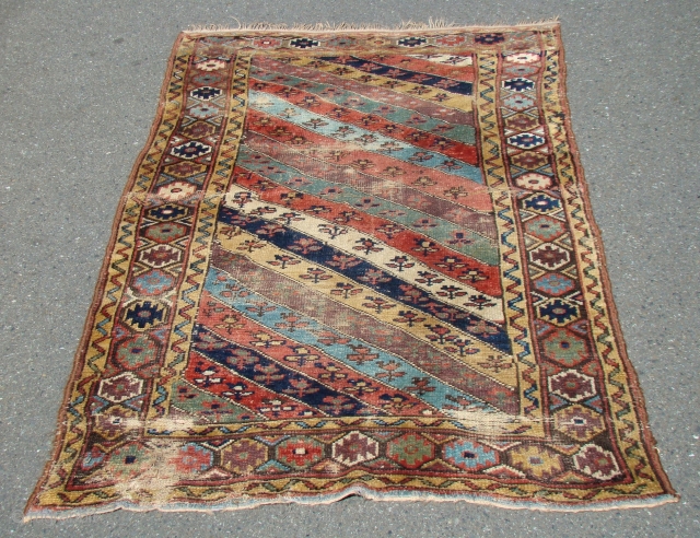 Kurdish rug with Wear as shown.
Measures 44" X 77".....112X196 cm                       