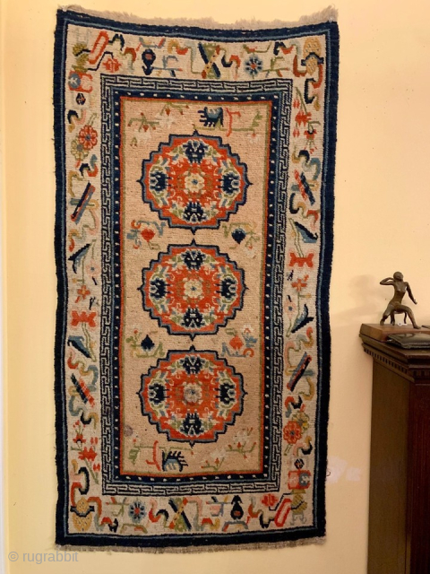 Antique Tibetan Khaden rug.
Originally woven by nomadic tribes and Monks, these textiles serve as versatile sleeping mats, meditation and sitting cushions, or even saddle rugs. Contact: antiquerugs@comcast.net

Size: 29X54     