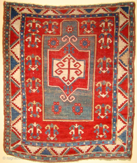 Caucasian Fachralo prayer rug in very good condition. 46"X56" Very soft and supple.
All original with a small 2X2" repair at the right side of the white medallion.      