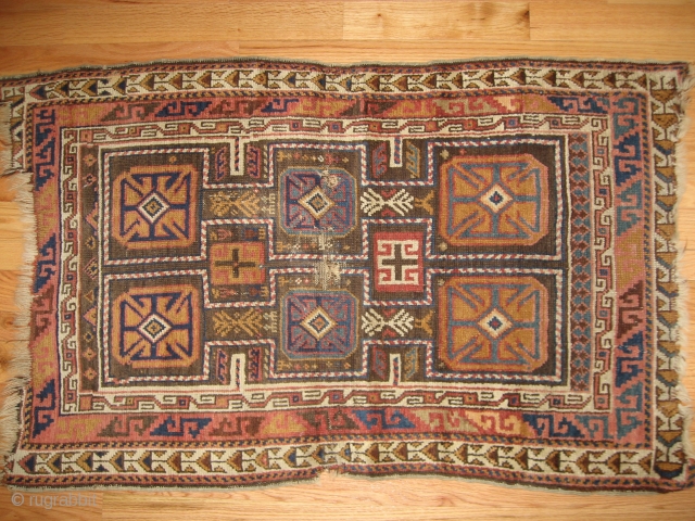 Moughan Caucasian? 54" x 32".  Wool foundation, central crease wear, intact original selvage, end loss.  Unusual construction.              