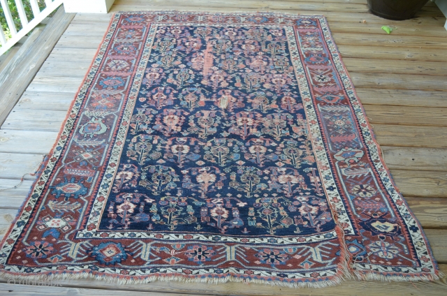 What we believe to be an Varamin Plain, wonderful age, extensive wear.  Measures 4' 5" x 6' 3".              