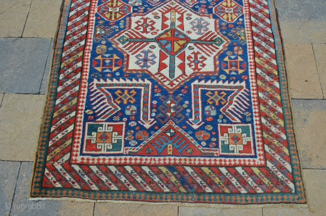 Beautiful early Akstafa, late 19th century.  Vivid colors, even wear.  Measures 9'3" x 3'5"                 