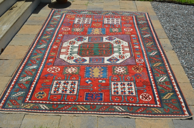 Karachopf Kazak, measures 5' 5" x 7' 7", end and field restoration, re-edged, a beautiful rug.                 