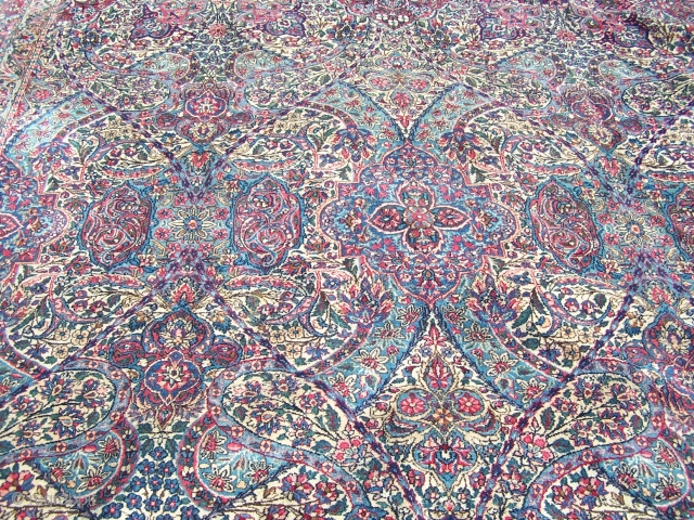 A very nice overall pattern early 20th Century Kirman carpet.  The carpet is in nice condition.  It measures 9'x15'.            