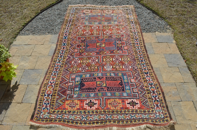 A very nice Kurdish carpet, circa 1900.  A couple of small repairs.  Great colors.  Measures 9'8" x 5'7"            