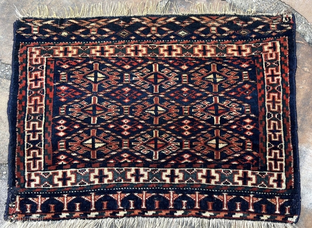 Turkmen yomud bag face with a very uncommon blue color. Good colors, fine weave. Please contact for more pictures and info. 1’4” x 1’11”         