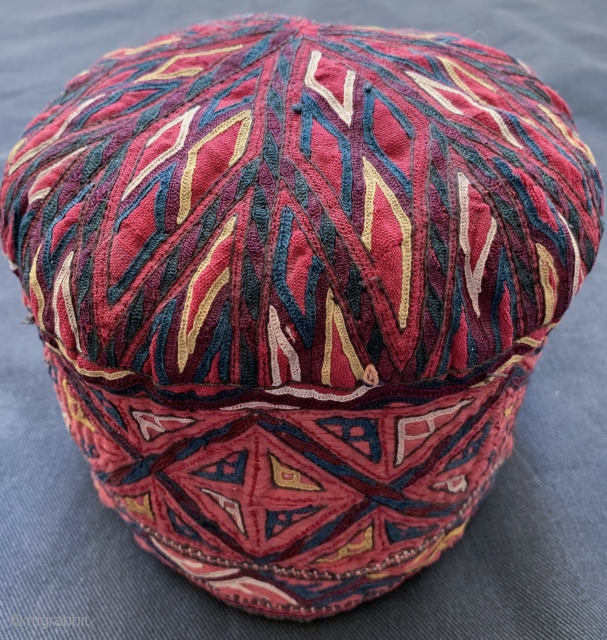 An rare antique Turkoman / Turkmen silk embroidered on silk bridal hat attributed to the Tekke / Teke tribe. Dating to the 19th century, this brilliant textile was an integral part of  ...