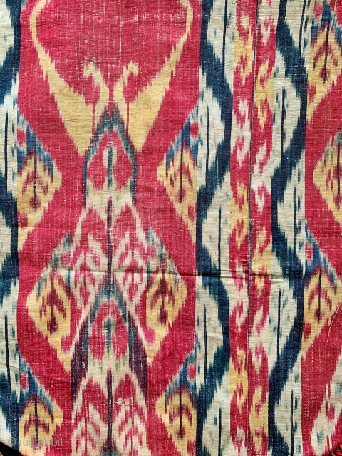 An outstanding Antique mid 19th century Uzbek Adras Ikat shield shaped hanging from Bokhara / Bukhara region. It is a haft rant / seven colour Ikat which is considered the highest form  ...