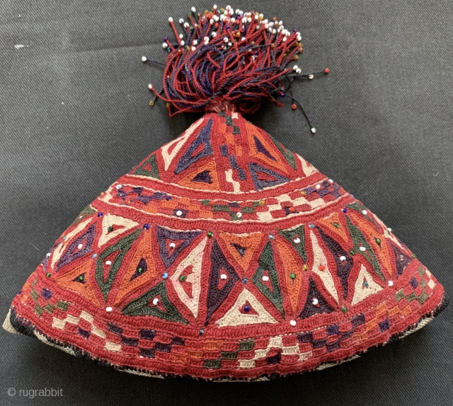 An excellent and very unusual silk embroidered antique hat made by the Turkoman / Turkmen Ersari tribe. This rare piece dates to the late 19th century and is fully silk embroidered. The  ...