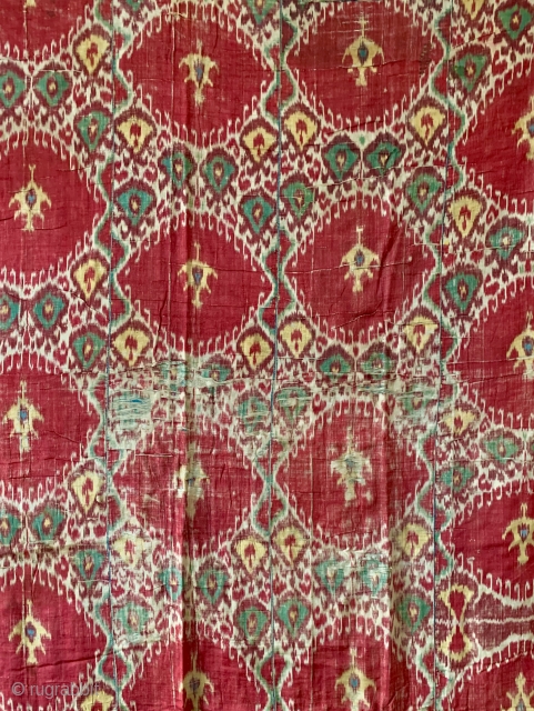 An exceptional antique Uzbek silk adras Ikat hanging from Bukhara / Bokhara. Dating between mid to third quarter of the 19th century, this is a silk warp and cotton weft Ikat (a  ...