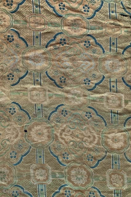 A rare antique imperial Chinese silk woven fabric, dating to the late Ming dynasty. The Chinese imperial dynasties went on for many centuries at a time. The Ming dynasty ran from 1368-1644  ...