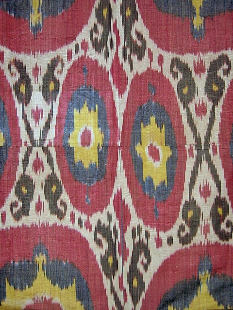 A Brilliant Antique Uzbek Adras Ikat Wall Hanging from Bokhara / Bukhara region. It is a 19th Cent. silk warp/cotton weft panel. a rich design with lovely central oval motifs interspersed with  ...