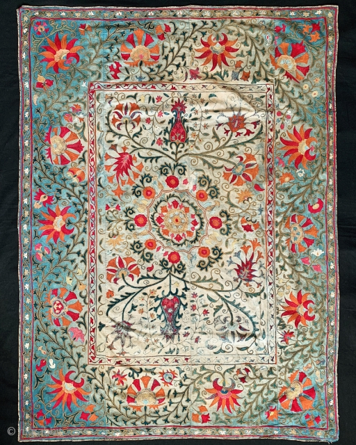 An Outstanding antique Uzbek Shahrisabz silk embroidered suzani from approx.mid 19th century. It has exceptionally fine silk chain stitched embroidery. The floral design is visually dazzling, with a central medallion surrounded by  ...