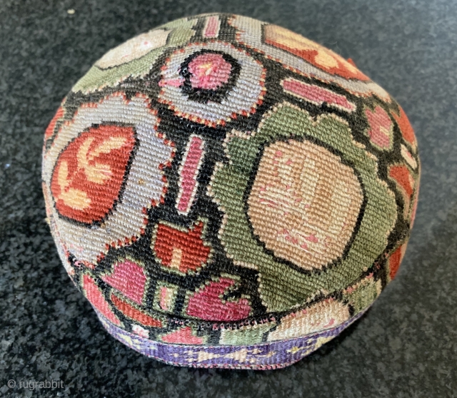 A beautiful antique Uzbek silk Iroqi stitched embroidered hat from Shahrisabz region. Dating to the late 19th century this rare hat is made of a form of cross stitched associated with the  ...