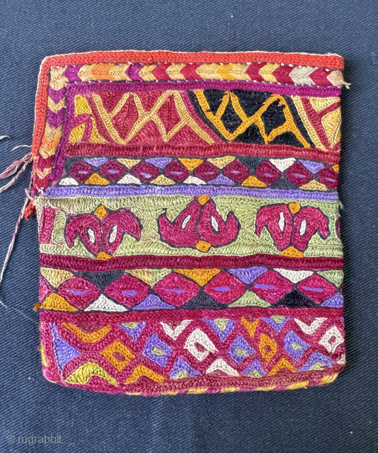 A visually dazzling Antique Turkoman / Turkmen Ersari tribe silk embroidered bag pouch dating to late 19th century - early 1900’s. It is a fully silk embroidered double-sided bag, very likely a  ...