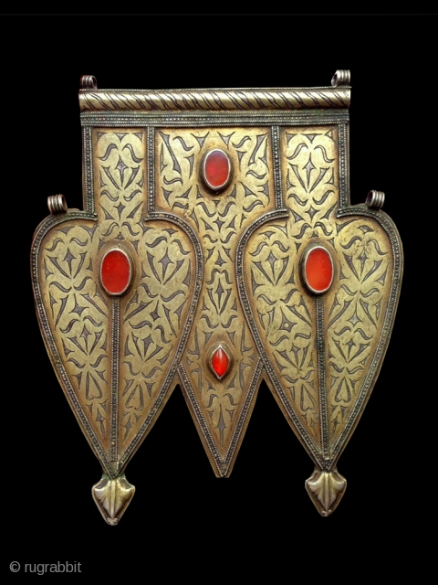 An Exceptional Antique Turkoman / Turkmen silver Double Asyk pendant with gold painted and fired and carnelian inset. This outstanding example wa made by the Tekke / Teke tribe and dates mid  ...