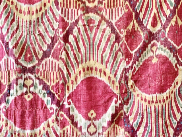 An outstanding and rare antique Uzbek silk adras Ikat hanging from Bukhara / Bokhara, dating to the mid 19th century. This very early example is a silk warp and cotton weft Ikat  ...