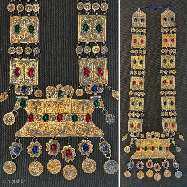 
An exceptional antique gold appliqué and silver Turkoman / Turkmen Yomut / Yomud tribe bridal necklace with the pendent in the shape of the tauk noska motif (double headed bird) . It  ...