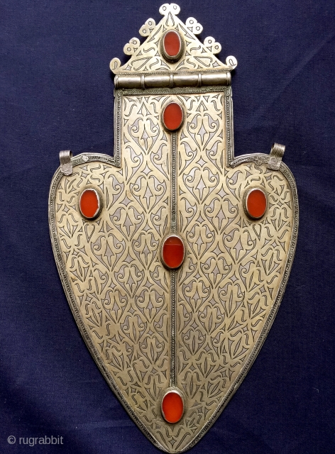 A majestic large Antique Turkoman / Turkmen gilded silver Asyk pendant and carnelian inset. This museum grade example was made by the Tekke / Teke tribe and dates mid to third quarter  ...