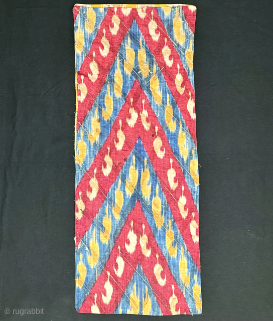 A magnificent antique silk warp / cotton weft Adras early Ikat fragment hanging from Bukhara. While it looks like a piece of modern art, it actually dates around mid 19th century. A  ...