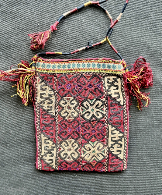 a very fine antique silk embroidered Turkoman Turkmen bag attribute to Yomud / Yomut tribes. Dating to the 19th century, this excellent Central Asian embroidery has wonderful workmanship with an archaic design ...