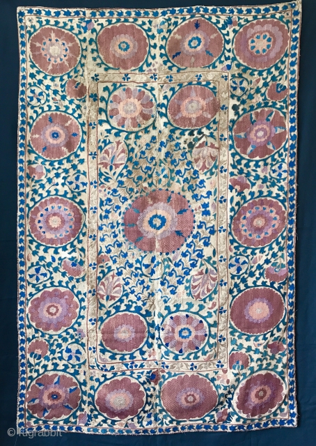 An elegant Antique Uzbek Bokhara nim Suzani / Susani dating between mid and third quarter of 19th Century..  the fine silk basma stitched embroidery and chain stitched embroidery is worked on  ...