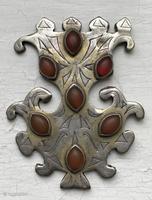 A very fine example of Antique Tekke Turkoman / Turkmen gold painted silver pendant with carnelian insets. Dating to the 19th century these intricately shaped bridal jewellery are known as Gulbaqa (literally  ...