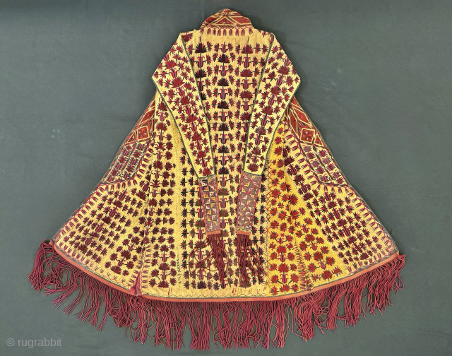 An outstanding and very rare published antique Tekke Turkoman / Turkmen silk embroidered on silk yellow Chyrpy ( Cherpi / Chirpi / Chyrpi ), dating to the second half of 19th Century.  ...
