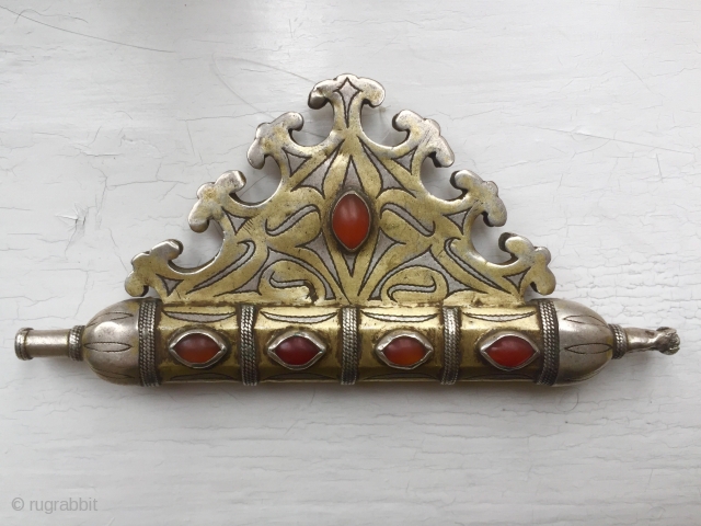 A highly collectible antique Turkoman / Turkmen silver pendant with gold gilding and carnelian (eye shaped) inset, dating to the 19th century. Attributed to the Tekke / Teke tribe of Central Asia,  ...