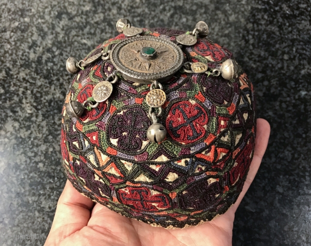 A rare complete antique silk embroidered Yomud / Yomut tribe Turkoman / Turkmen young man / boy's hat with original gold appliqué on silver  talismanic crown. There is a distinctive beauty  ...