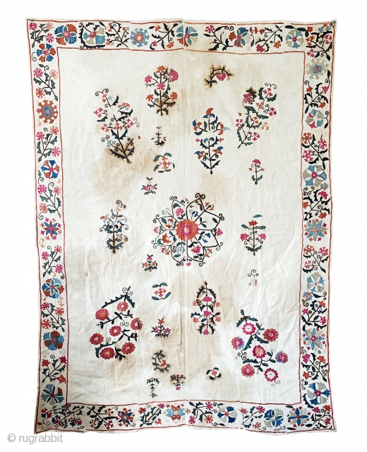 A beautiful antique Uzbek Nurata silk embroidered suzani / susani , dating to the last 19th Century. It is relatively large piece with flat stitched (basma stitched) silk embroidery on a cotton  ...