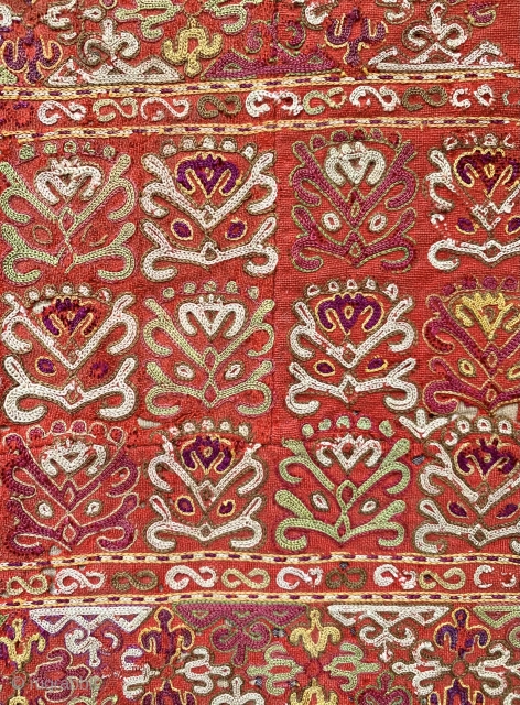 An exceptional antique Turkoman Turkmen Chodor tribe silk embroidered sleeve (opened) dating to the19th century. Chodor silk needlework were often done on red bannat trade cloth and were some of the finest  ...