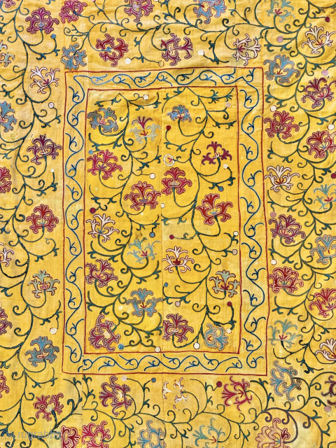 A beautiful antique Uzbek silk embroidered suzani on a yellow cotton ground from rural Shahrisabz region.  Dating to the early 3rd quarter of the 19th century, it boasts an extremely fine  ...