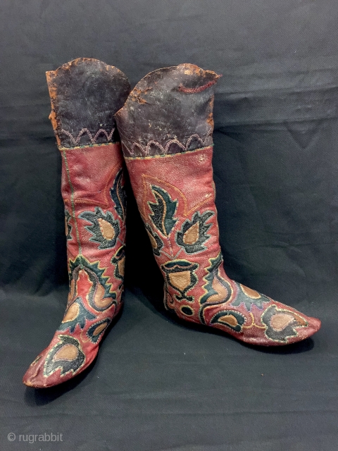 An exceptional antique Central Asian leather appliqué boots dating to the second half of the 19th century. This particular is relatively older than most one sees in the market and many of  ...