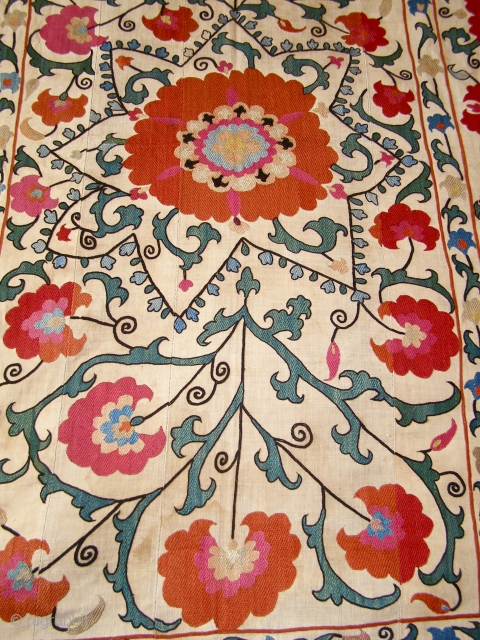 An enchanting suzani - Silk embroidery on hand-spun cotton ground - circa 1850.
It measures an ideal 216cm x 147cm (85" x 58") approx. A very find stitch with superb colours, all natural  ...