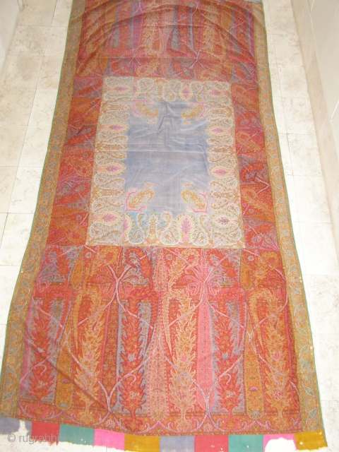 Offered here is a superb antique Kashmir shawl, made in the kani weave and attributed to the late Sikh period, to circa 1850. It shows splendid, vivid colours, superior design charactristics typical  ...